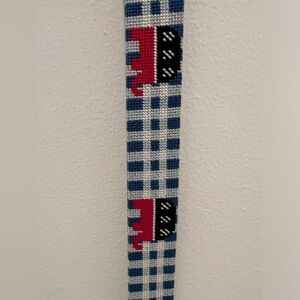 Men’s needlepoint patriotic elephants belt. Size 34. In excellent condition.